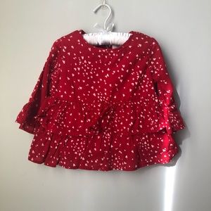 Quarter sleeve top with heart print